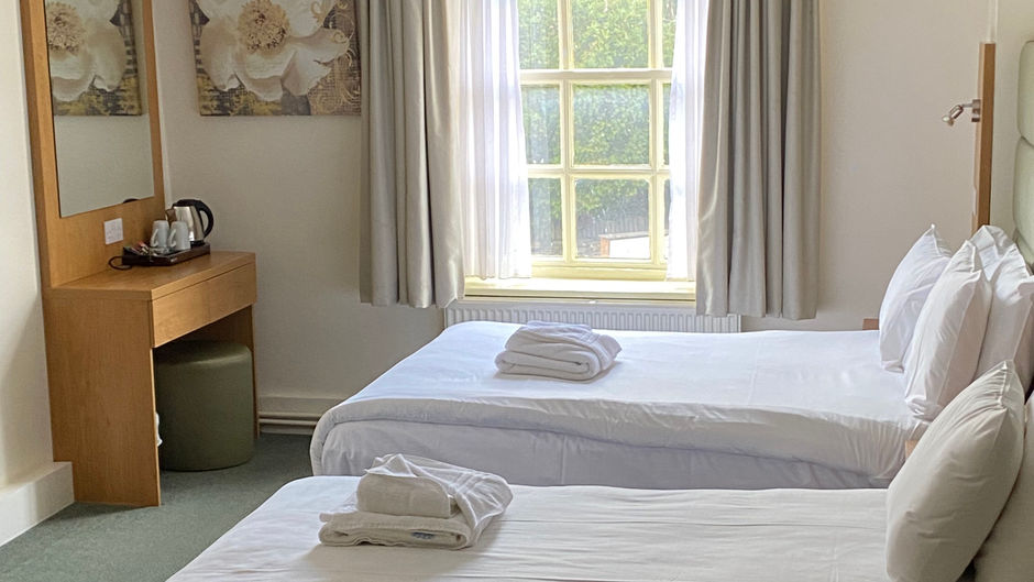 New Inn Hotel Room