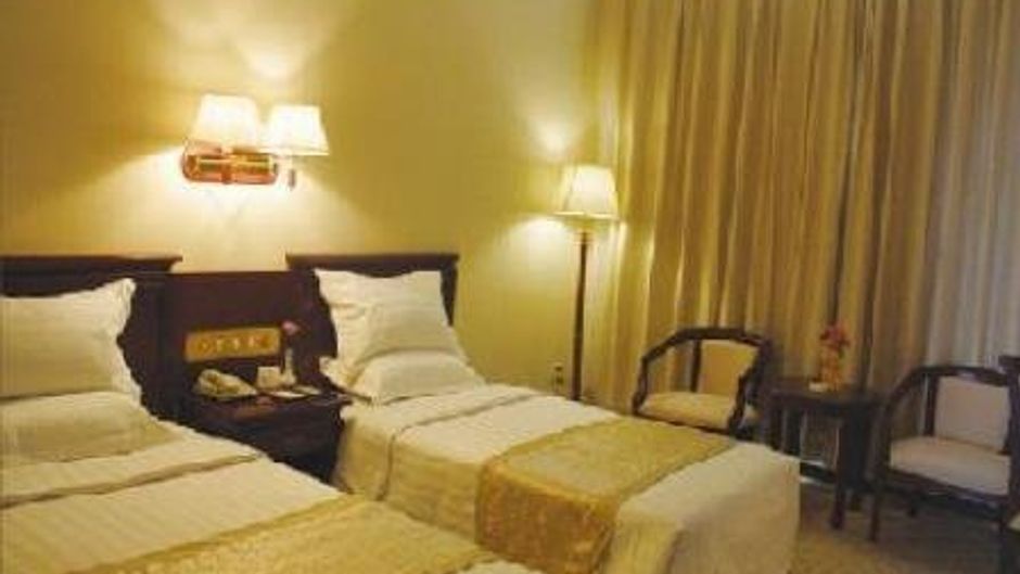 Jinhangxian International Business Hotel Room