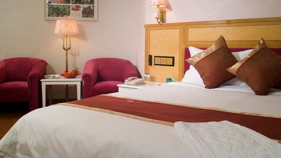 Silver Land Hotel Dongguan Room