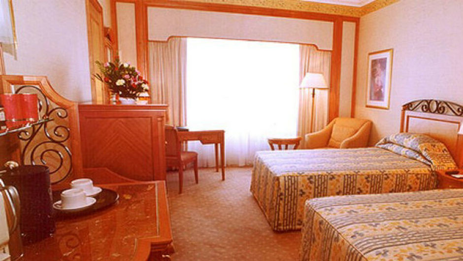 Regency Grand Hotel Room