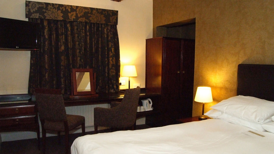 The Manor Hotel Room