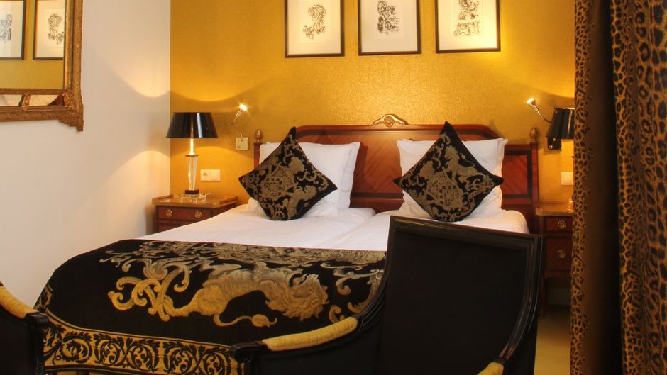Ambassade Hotel Room