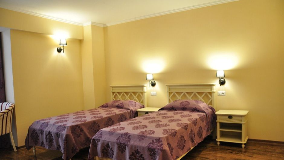 Vigo Grand Hotel Room