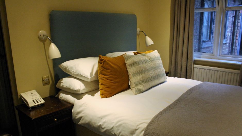 The Falstaff Hotel Room