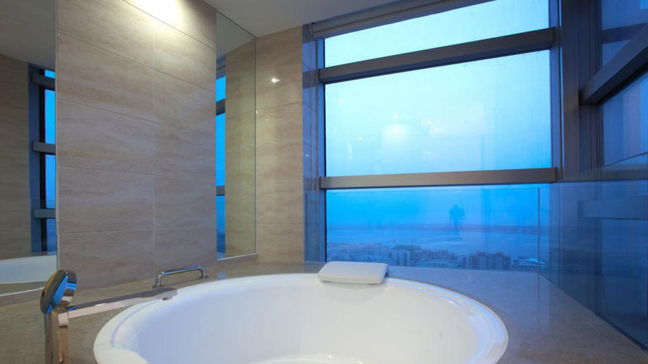 New Century Grand Hotel Qingdao Room