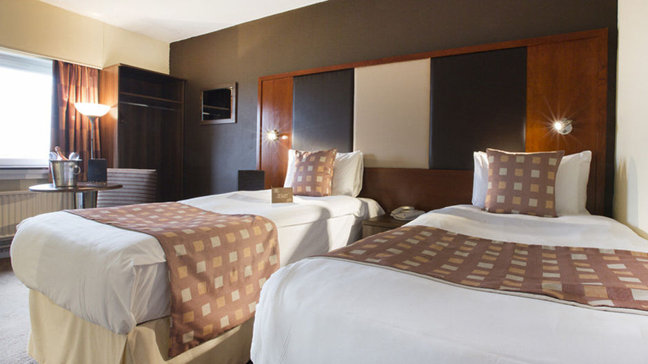 The Normandy Hotel Room