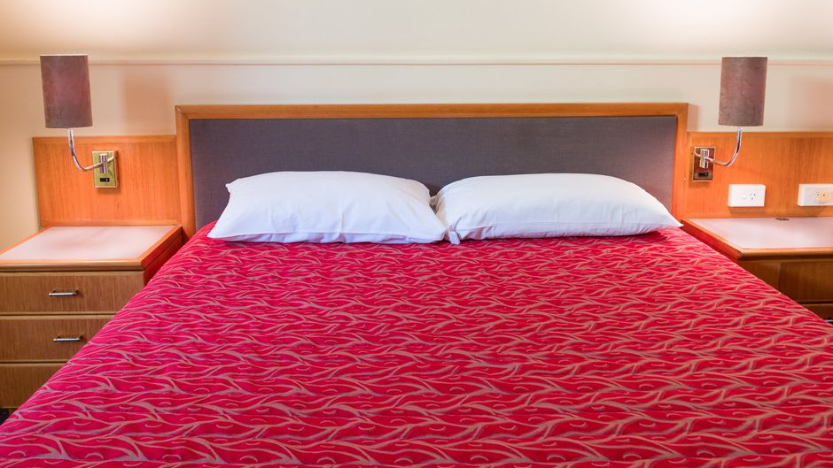 The Q Motel Room