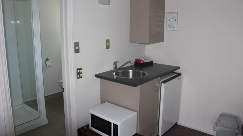 Centennial Court Motor Inn Room