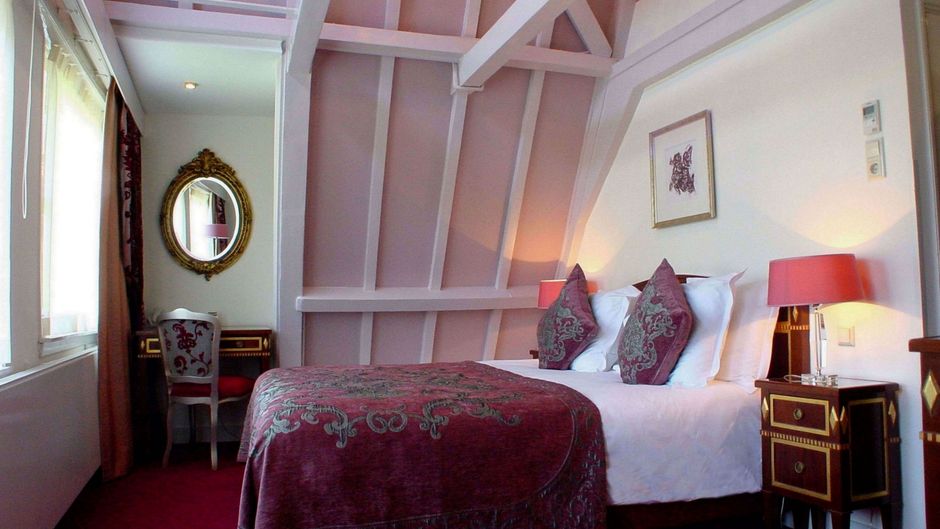 Ambassade Hotel Room