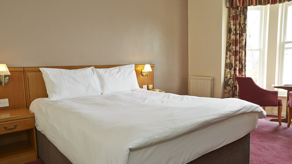 The Rising Sun Hotel Room