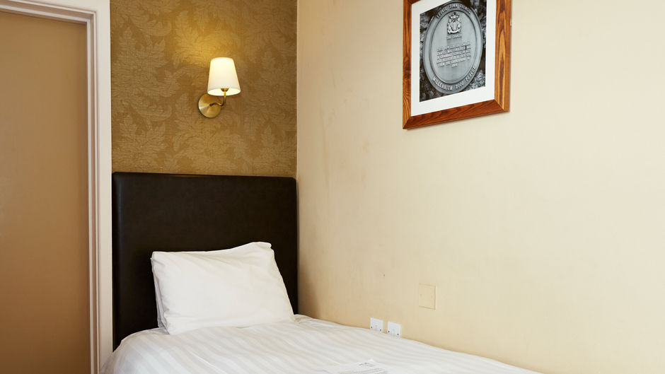 The Manor Hotel Room
