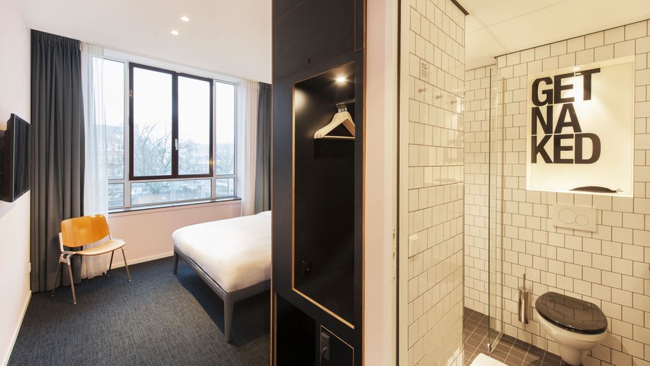 Conscious Hotel The Tire Station Room