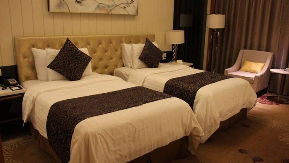 New Century Grand Hotel Siyang Room