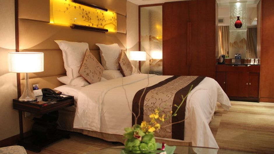 Gehua New Century Hotel Room