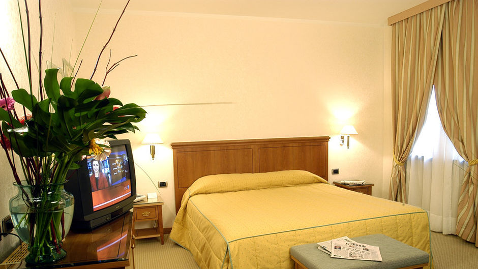Excelsior Hotel Room