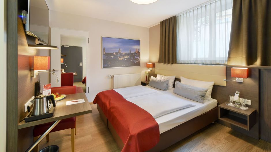 Koos Hotel & Apartments Room
