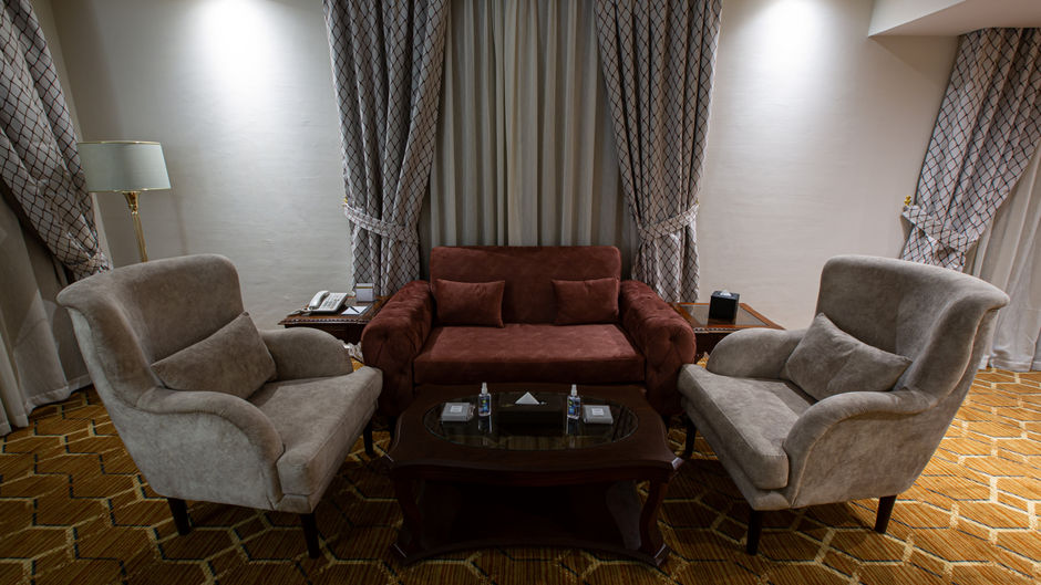 Triumph Plaza Hotel Room