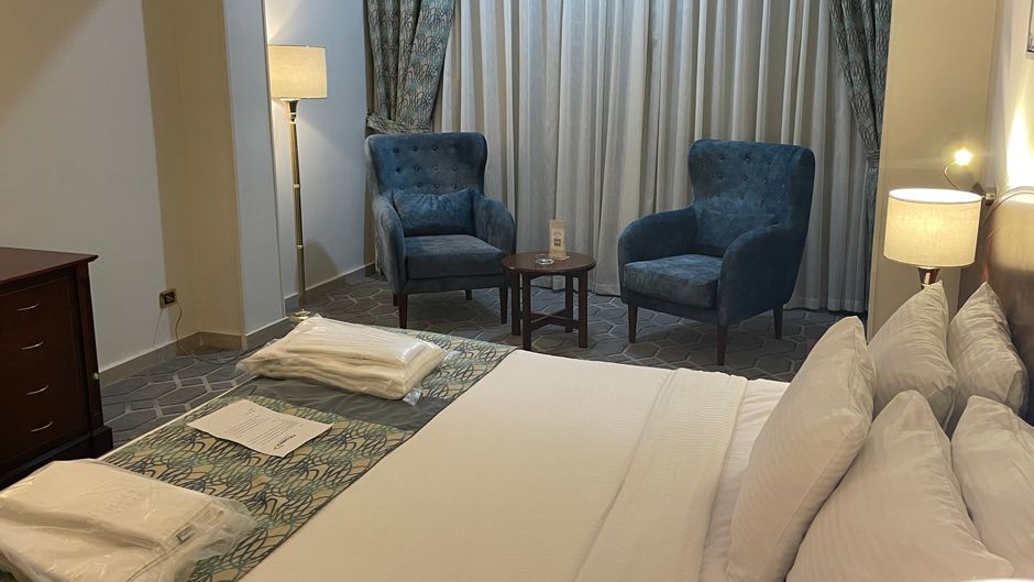 Triumph Plaza Hotel Room