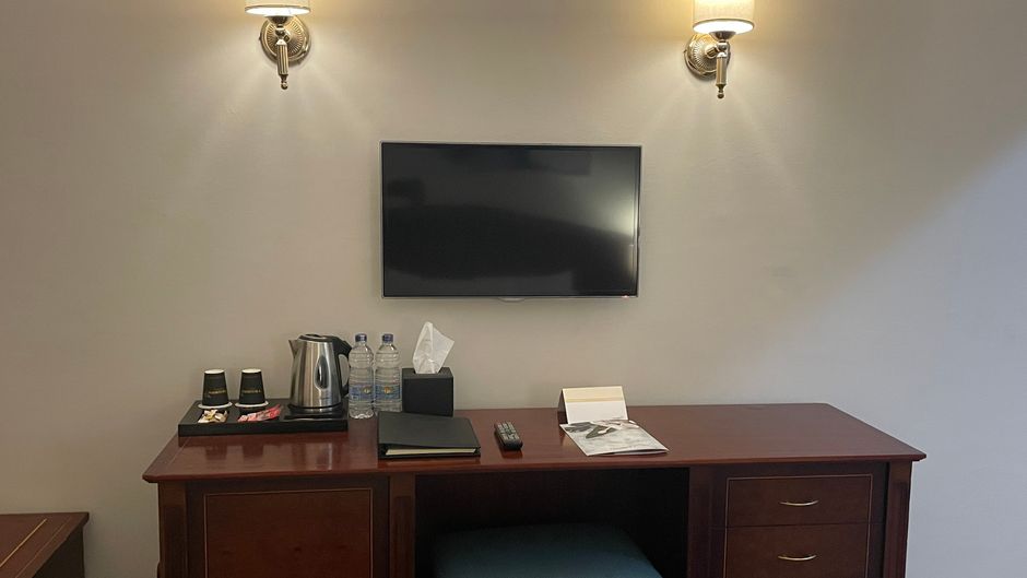 Triumph Plaza Hotel Room