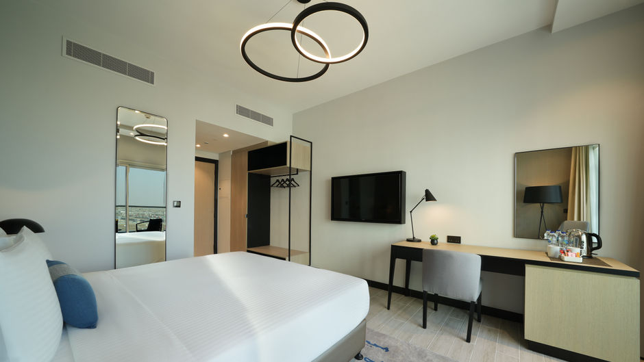 Damac Hills 2, Edge by Rotana Hotel Room