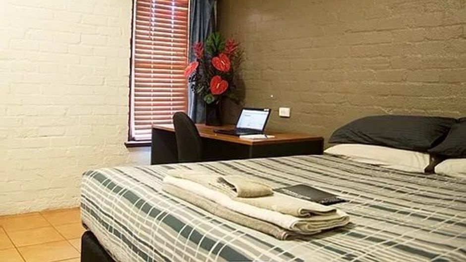 Newman Hotel Room