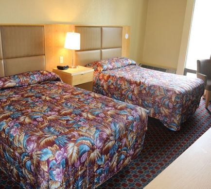 I-Drive Grand Resort & Suites Room