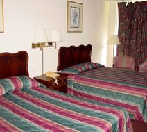 Amerihome Inn & Suites Room
