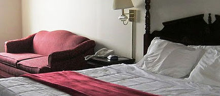 Voyageur Inn & Conference Center Room