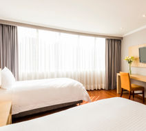 Cosmos 100 Hotel & Convention Center Room