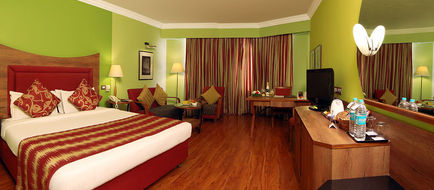 Cama Hotel Room