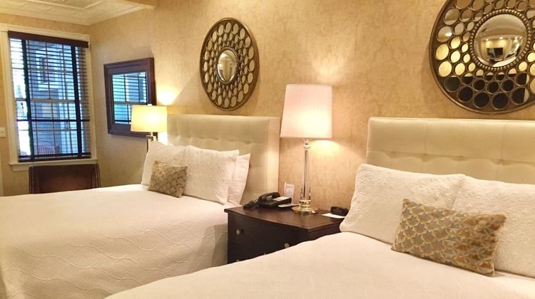 The Chateau Inn & Suites Room