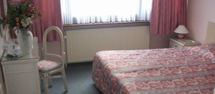 Olympia Hotel Room