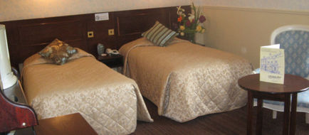 The Club House Hotel Room