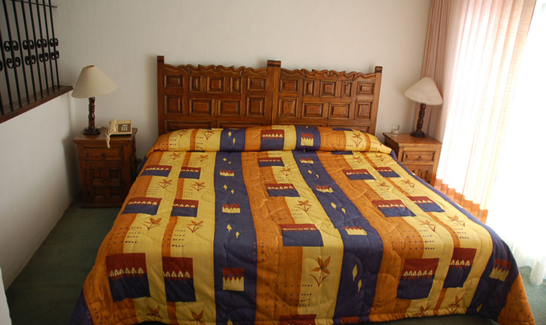Suites Internacional Hotel Room