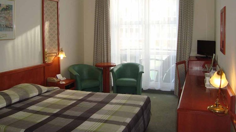 Le Dome Hotel Room