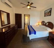 Hotel Quijote Inn Room