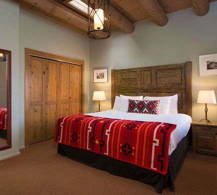 Zona Rosa Suites Room