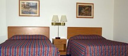 All Seasons Inn & Suites Room
