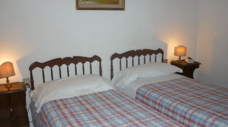Fedora Hotel Room
