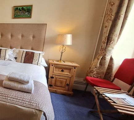 The Camelot Castle Hotel Room