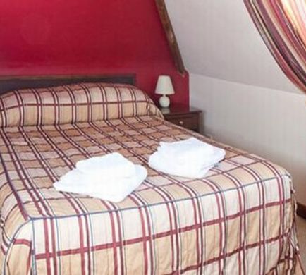 The Pilgrims Hotel Room