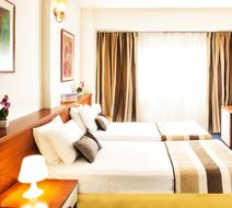 Plaza Hotel Room