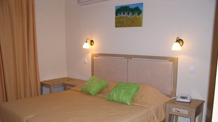 Astra Village Hotels & Suites Room