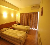 Aristoteles Hotel Room