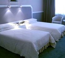 Hui Heng New Asia Hotel Room