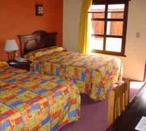 Plaza Magnolias Hotel Room