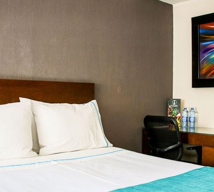 Country Hotel & Suites Room