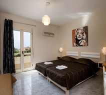 Axos Hotel Apartments Room