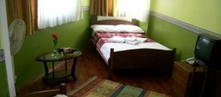 Rose Hotel Room