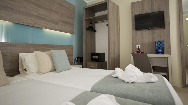 115 The Strand Hotel & Suites Room